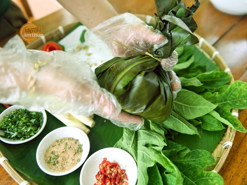 Món cá trắm hấp lá đu đủ của dân tộc Thái